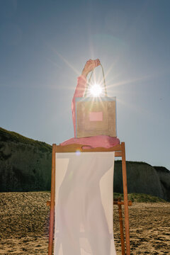 Sunny Beach Bag Art Installation On Shore