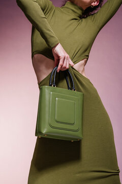 Green Ensemble With Olive Handbag Pose