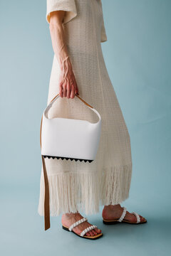 Elegant Cream Fringe Dress With White Bag