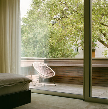 Private Terrace with Woven Lounge Chair