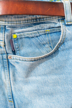 Close-up of Denim Jeans with Leather Belt