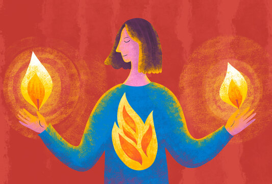 Person holds flames with both hands in a bright setting
