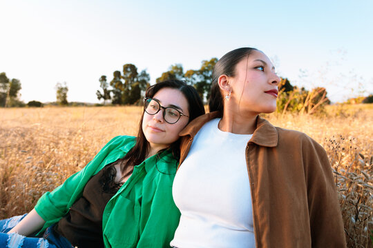 Female Friends Resting in Field