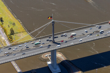 Fototapeta premium Aerial view of West Gate Bridge over the Yarra River in Port Melbourne, Victoria