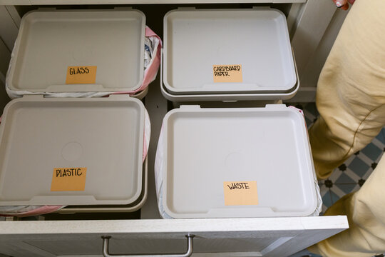 Kitchen Sorting Trash and Recycling