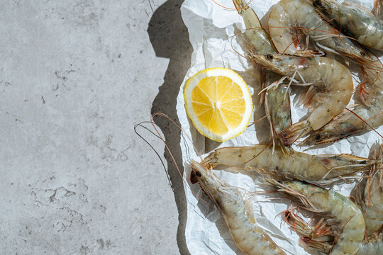 Raw Shrimps on Parchment with Lemon