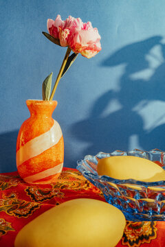 Colorful still life with flowers and fruits