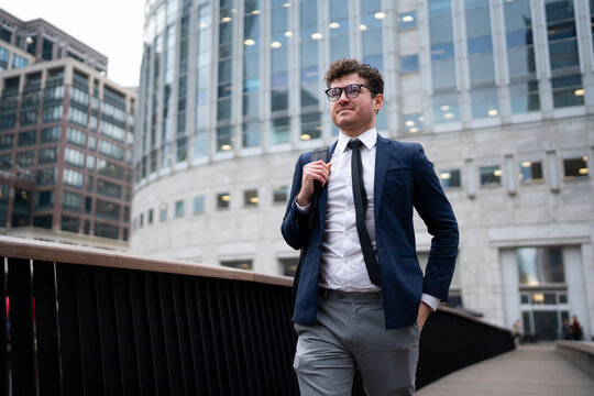 Business man walking in the city

