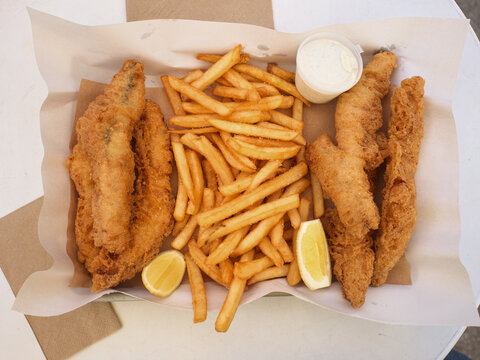 Fried Fish and Chips Served With Lemon and Tartare Sauce