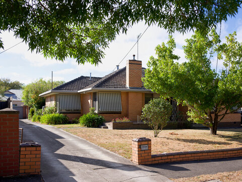 Australian House With Garden and Driveway