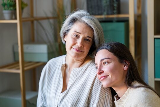 Mother And Daughter Embracing