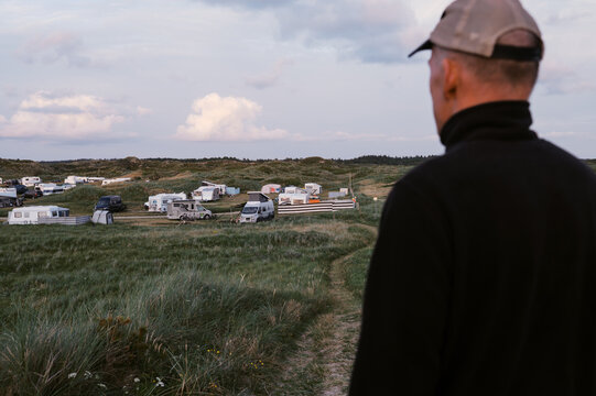 man overlooking campground at sunset in denmark