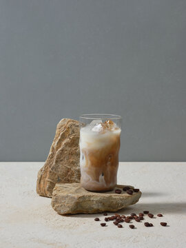 Refreshing Iced Coffee Beverage Served Over Rustic Stones