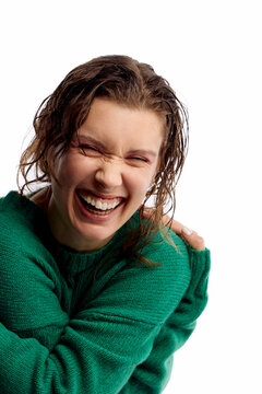 Beautiful laughing woman in the studio
