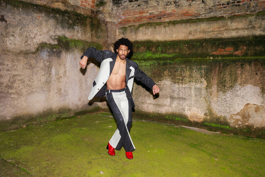 Fashion Model Dances in an Empty Urban Space 