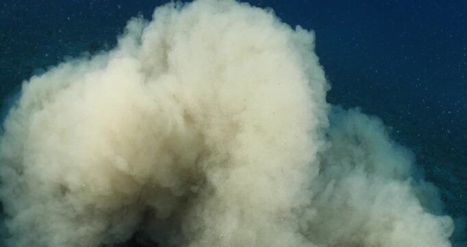 sand underwater moving making shapes  no gravity like sand storms and clouds