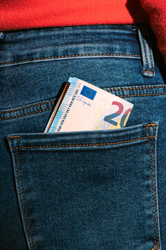 Close-up of Euro Banknotes in Blue Denim Jeans Back Pocke