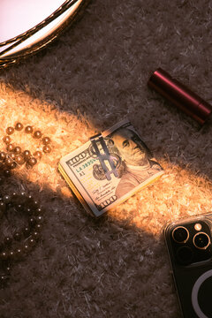 Luxury Flat Lay with Hundred Dollar Bills and Pearl Jewelry