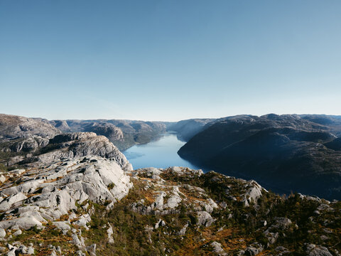 Majestic Norwegian Fjord Landscape Under Clear Blue Sky
