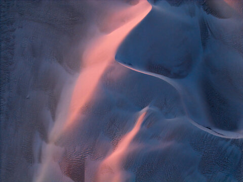 Sand dunes with a Pink Glow at Sunset. 
