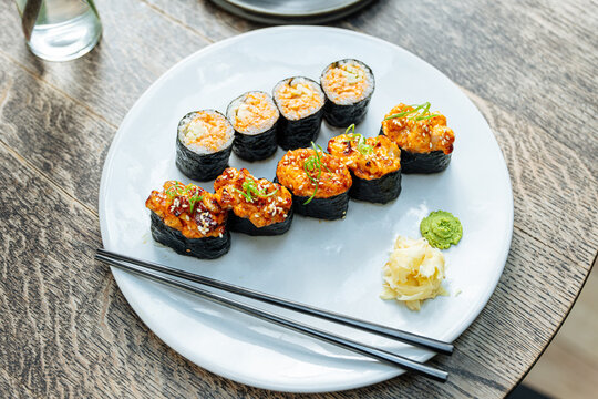 Spicy sushi rolls with wasabi and pickled ginger 