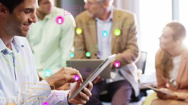 Man tapping tablet in business meeting, sharing user icons and messages, camera pulling back