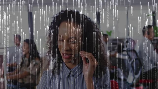 Woman receiving customer service call, adjusting headset and laughing, code rain overlaying frame