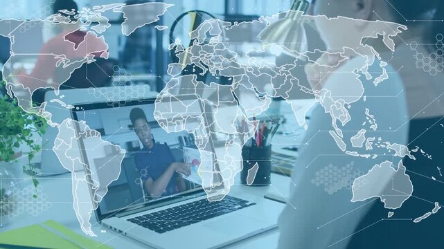 Seated woman watching laptop, host showing swatch causing world map hex overlay for business review