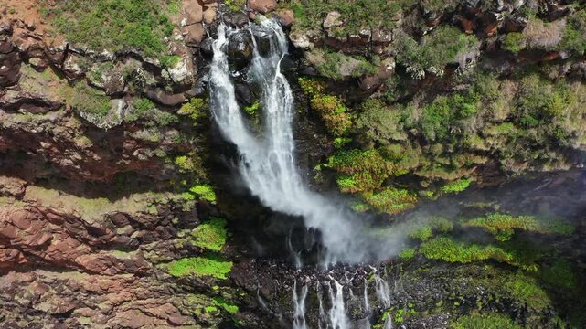 Majestic waterfall rainbow Waimea Canyon Kauai, Hawaii