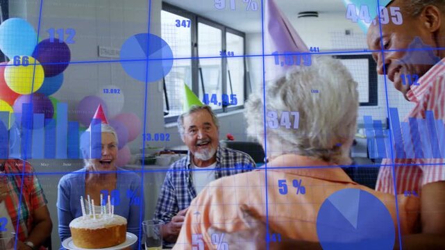 Care group gathering around cake, standing man moving placing hand on guest, blue charts overlay