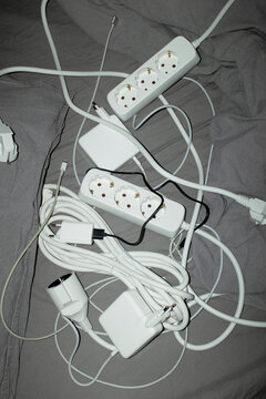 Contemporary electronic technology wires and charges on bed sheets