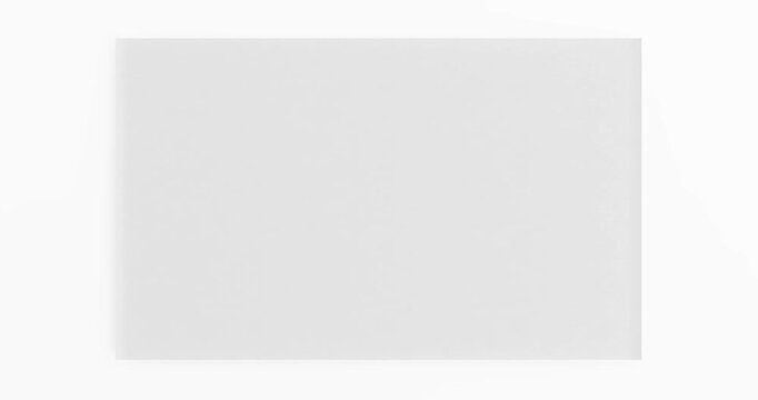 4k Resolution Video: Blank White Mockup Rolled Paper Poster With Clean Surface Opening From Center On White Background With Alpha Matte