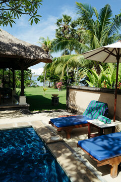 Relaxing Poolside Retreat in a Tropical Paradise by the Ocean