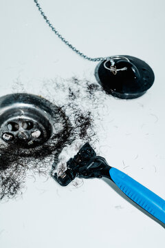 shaving residue and hair near the drain