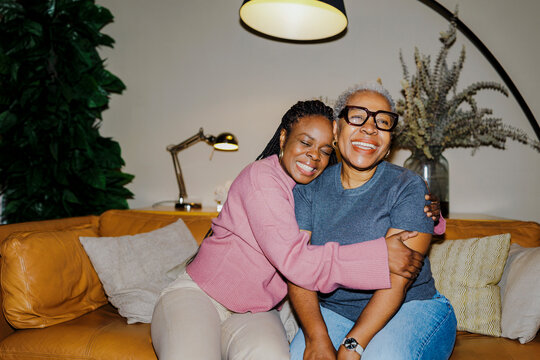 Mother and daughter embracing celebrating togetherness and joy ugc