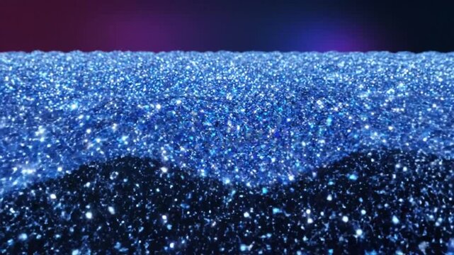 Shimmering blue glitter surface with sparkling light reflections in slow motion, abstract background