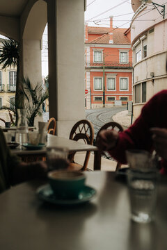 Cafe table view overlooking quiet European street