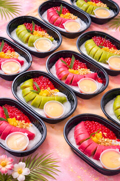 Colorful Tropical Dessert Boxes with Fresh Fruit and Sweet Toppings