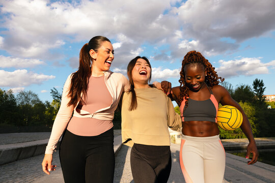 Multiethnic friends enjoy workout at Madrid Rio