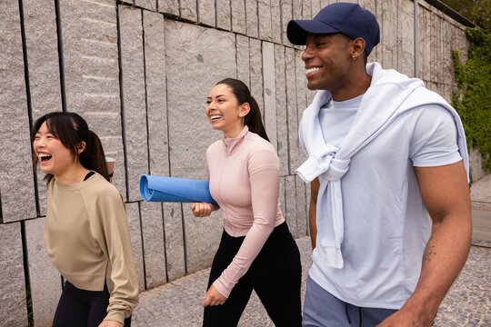 Friends enjoying an outdoor workout in Madrid