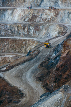 Winding access road through open pit mine