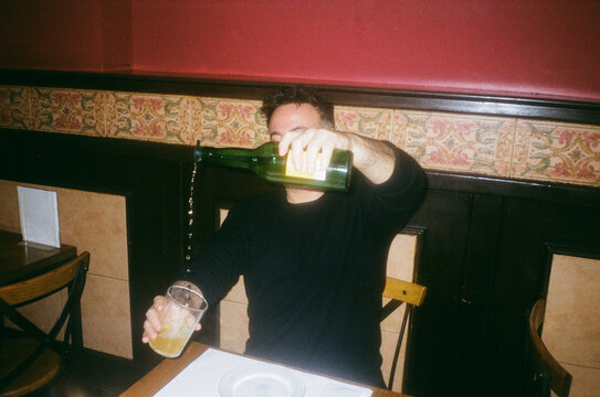 Film Camera Photo Of Man Pouring Natural Spanish Cider