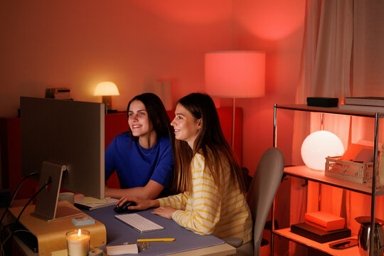 Women demonstrate teamwork in a cozy home office business setting