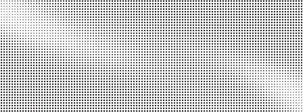 Halftone dots pattern with gradient effect on white background
