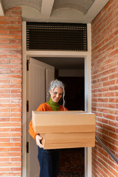 Senior woman receiving package