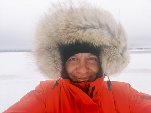Selfie Taken on Ice in a Cold Location During Winter Season