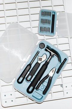 Blue working and building tools and equipment hammer, screwdriver