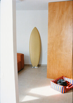 Film shot of a space in a contemporary apartment with wooden furniture