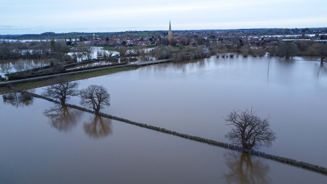 aerial shot of flooded countryside in winter
