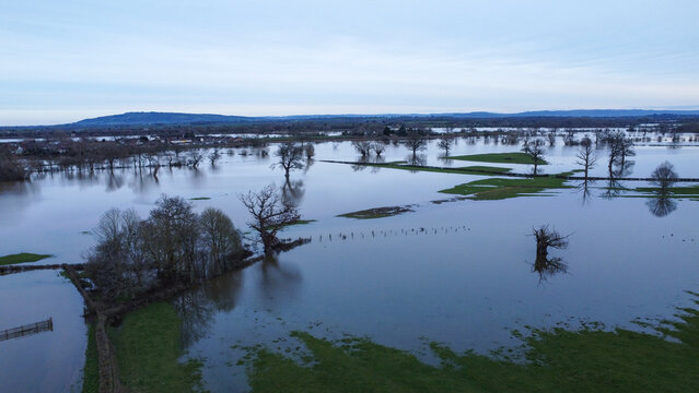 aerial shot of flooded countryside in winter